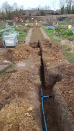 Top road pipe trenching